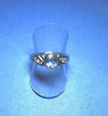 Sterling Silver oval Bezel Set Blue Topaz and Cubic Zirconia Ring - R2810