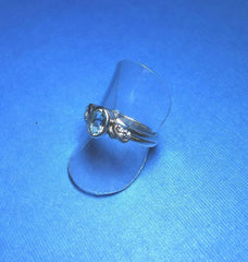 Sterling Silver oval Bezel Set Blue Topaz and Cubic Zirconia Ring - R2810