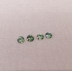 1.35 Carat Total Round Brilliant Cut Green Sapphires