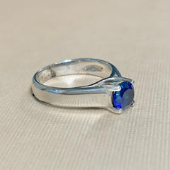 Sterling Silver Crossover Setting Synthetic Sapphire Ring - R1816