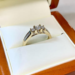 10ct Yellow Gold Engagement Ring With Trio Of Princess Cut Diamonds - R1805